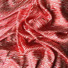 Load image into Gallery viewer, Red and white satin fabric with diagonal stripe in small squares throughout the fabric and displayed in a swirl.