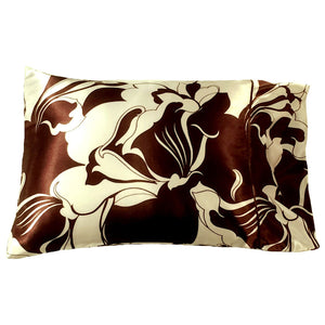 An accent pillow with a brown and white floral design cover. The pillow measures 12" x 16".
