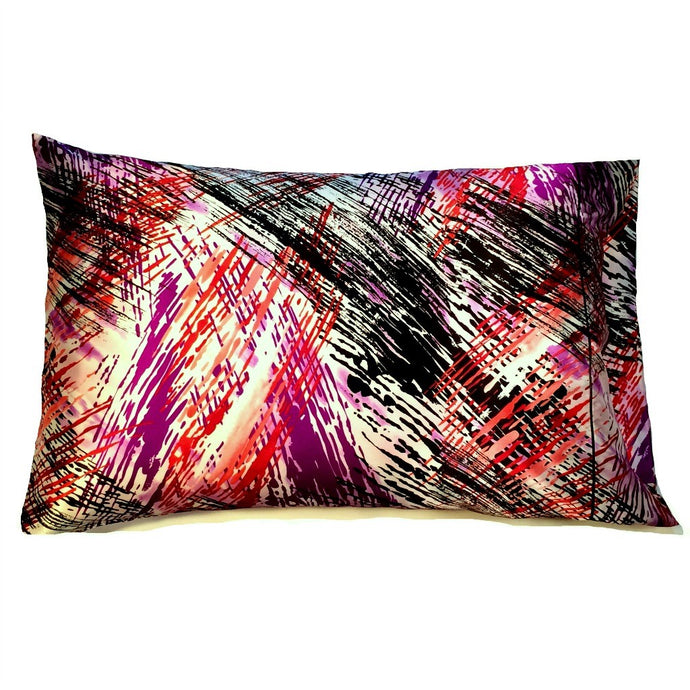 A modern style satin pillowcase with orange, purple, black and white splashy lines.