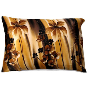 A bed accent pillow with a gold and brown floral print pillowcase. The pillow measures 12" x 16".