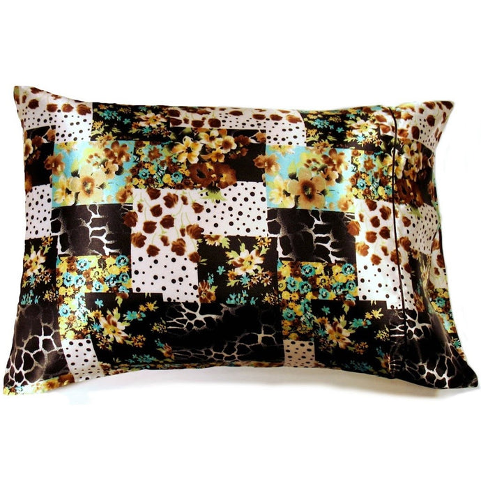 A modern rustic pillow with a patchwork animal print and floral design cover. The pillow measures 12