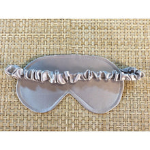 Load image into Gallery viewer, A back view of a platinum satin eye mask showing the strap that is covered in platinum satin material.
