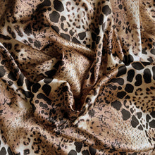 Load image into Gallery viewer, Tan, brown and black satin fabric in a leopard aftrican animal print displayed in a swirl.
