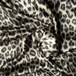 satin material in a black and gray swirled leopard print.