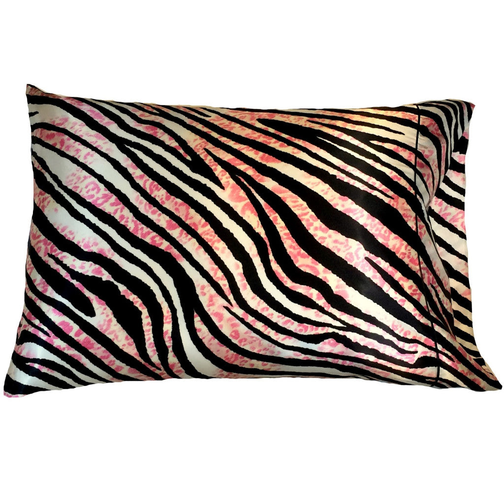 A white, black and pink zebra print satin pillowcase.