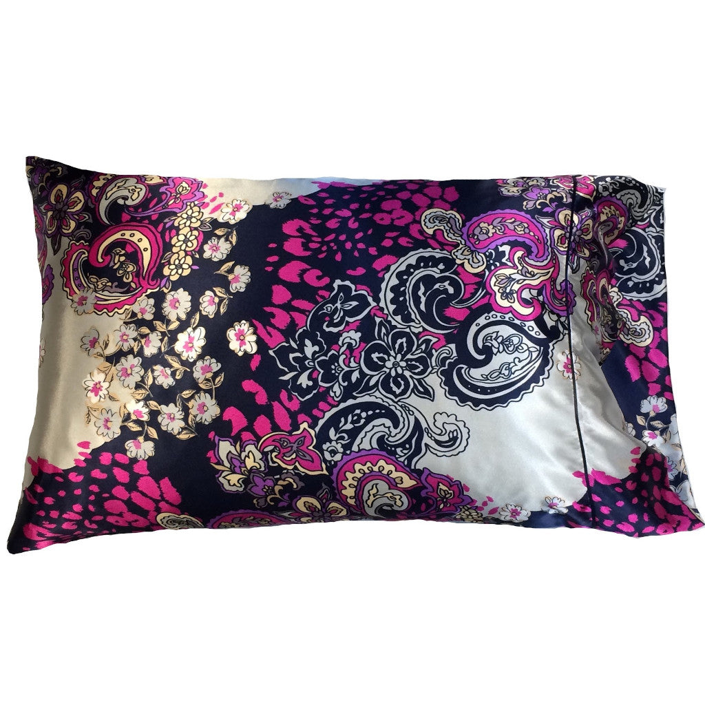 A paisley print satin pillowcase in navy blue, purple, pink and silver.