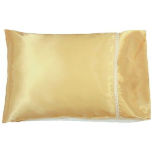 Yellow satin pillowcase with a white ribbon on the hem.