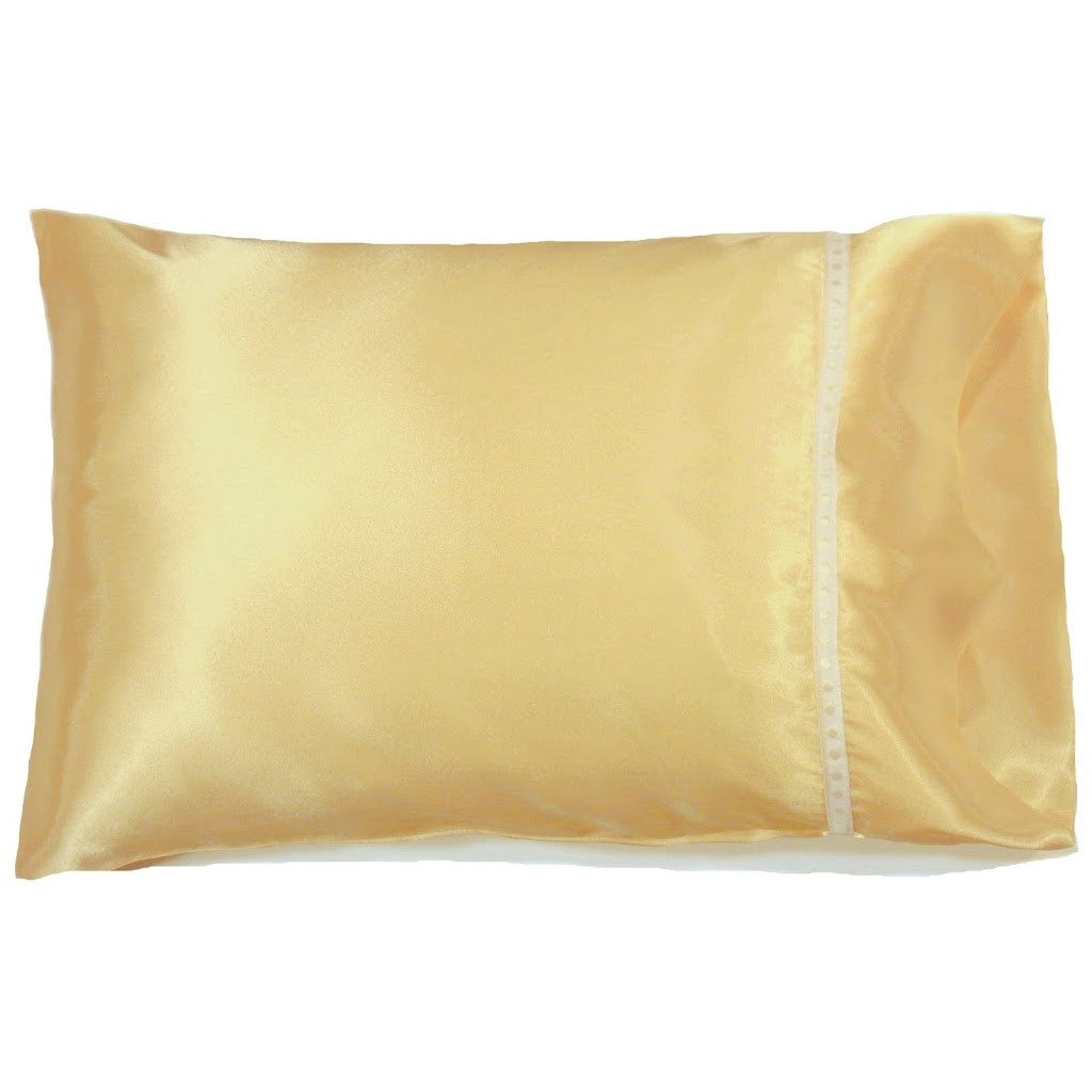 Yellow satin pillowcase with a white ribbon on the hem.