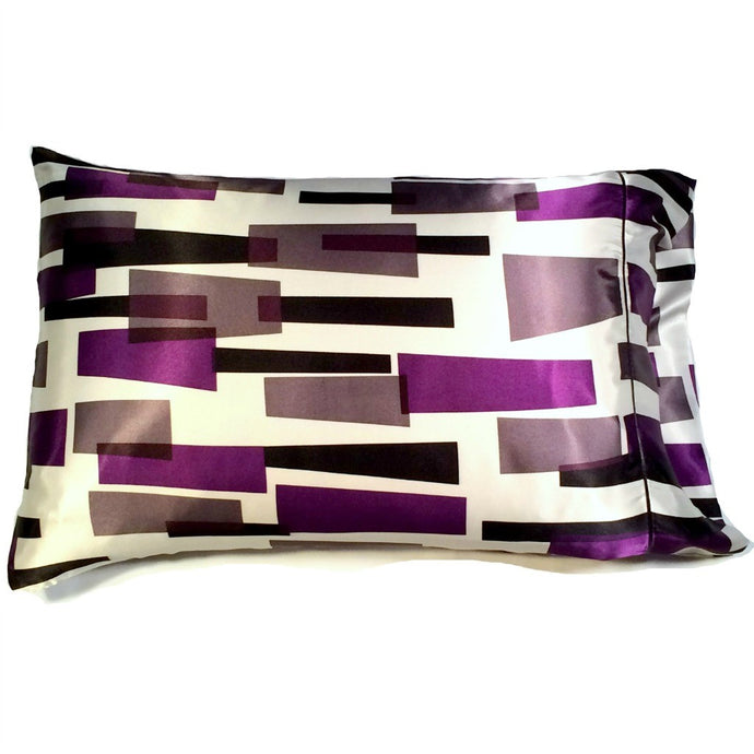 Our satin pillowcase in a black, white and purple modern abstract design. There are vertical rectangular shapes.
