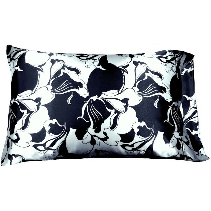 An accent pillow with a navy blue and white print cover. The pillow measures 12