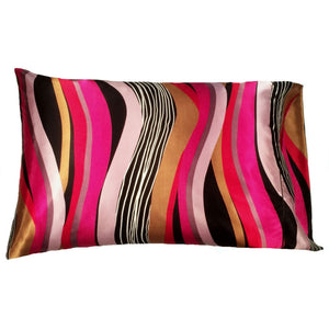 A bed pillow with gold, pink, black and white swirly lines going vertically up the pillow. The pillow measures 12" x 16".