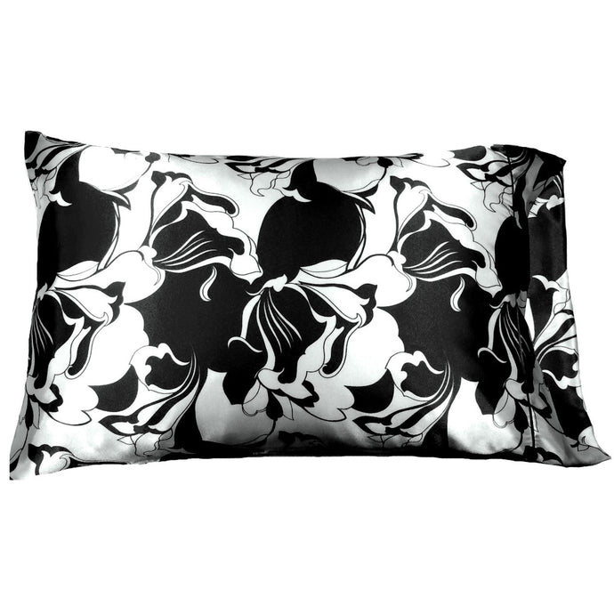 An accent pillow with a black and white print cover. The pillow measures 12