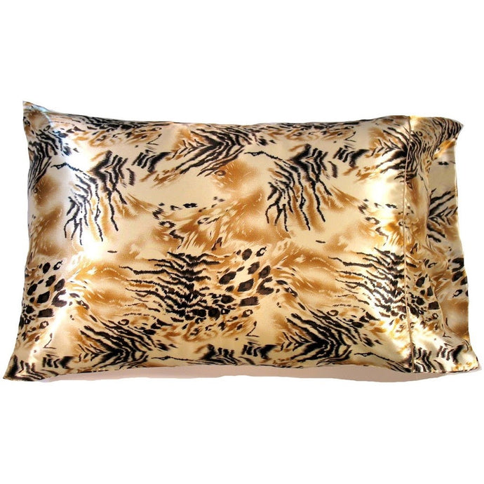 A bedroom accent pillow with a black and gold, African print cover. The pillow measures 12