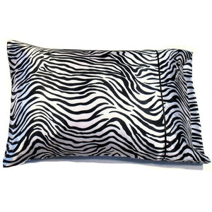 An accent pillow with a black and white zebra print cover. The pillow measures 12" x 16".