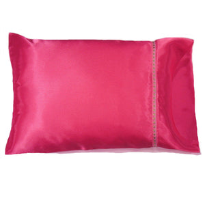A bedroom pillow with a bubblegum pink solid cover. The pillow measures 12" x 16".